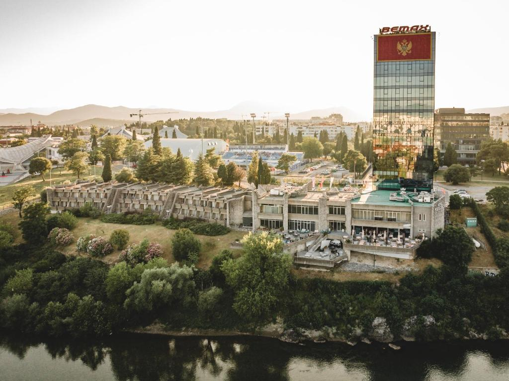 Aerial view of Hotel Podgorica between the Morača river and the city